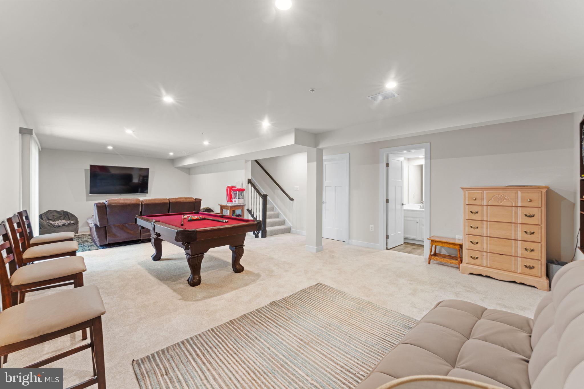 8003 Trimbles Ford Lane Brandywine, MD 20613 - Photo 40 of 70 a living room with furniture and a gym equipment