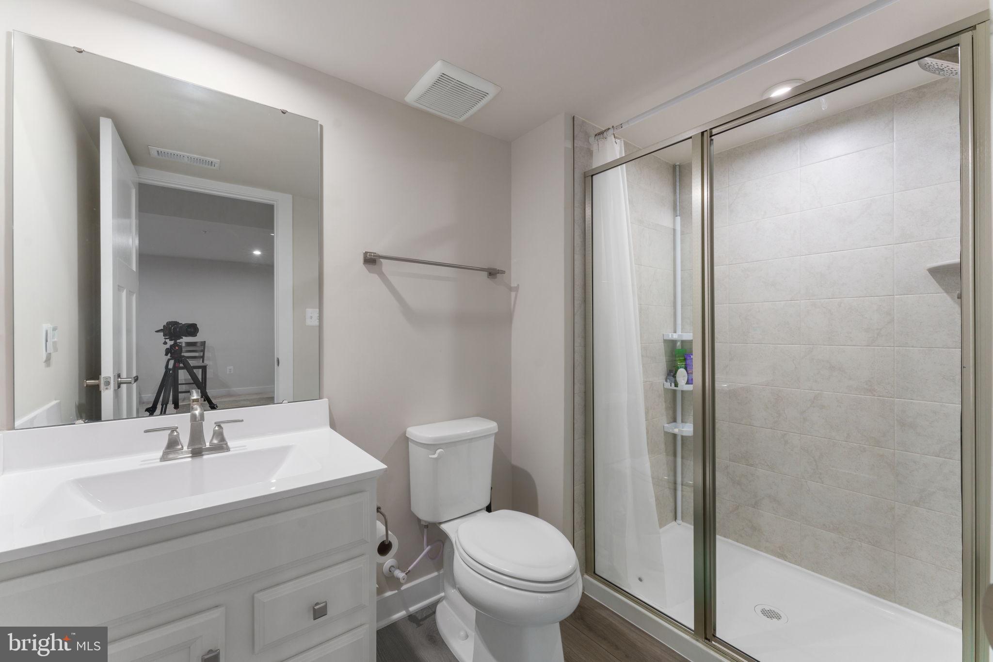 8003 Trimbles Ford Lane Brandywine, MD 20613 - Photo 47 of 70 a bathroom with a sink toilet and shower