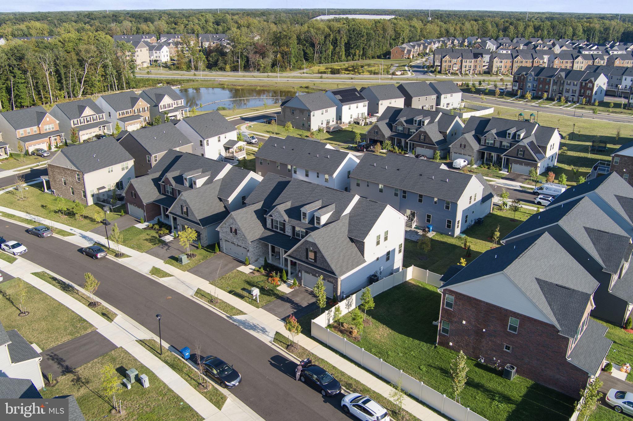 8003 Trimbles Ford Lane Brandywine, MD 20613 - Photo 66 of 70 an aerial view of a house with a lake view