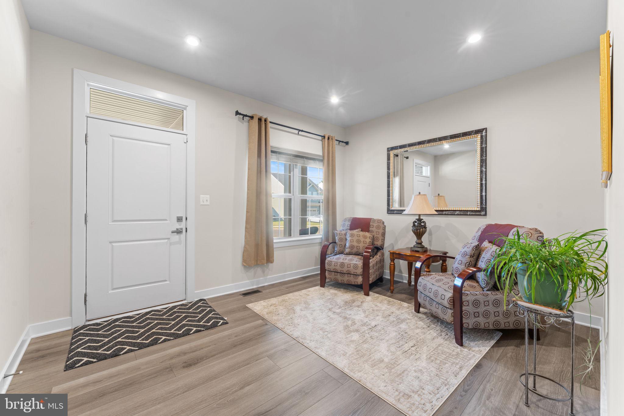 8003 Trimbles Ford Lane Brandywine, MD 20613 - Photo 9 of 70 a living room with furniture and a potted plant
