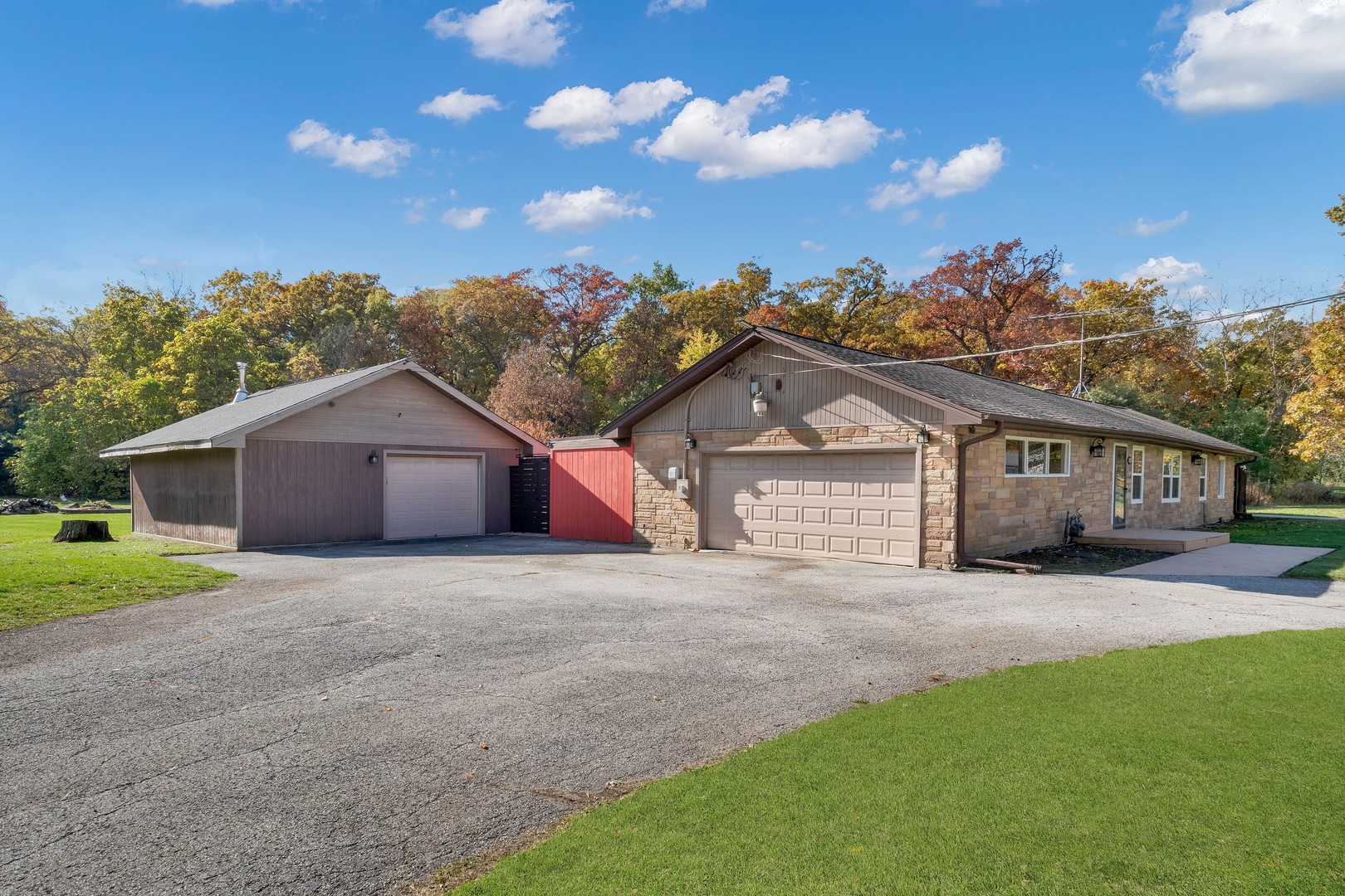 2135 West Richton Road Steger, IL 60475 - Photo 1 of 35 a front view of a house with a garden and yard