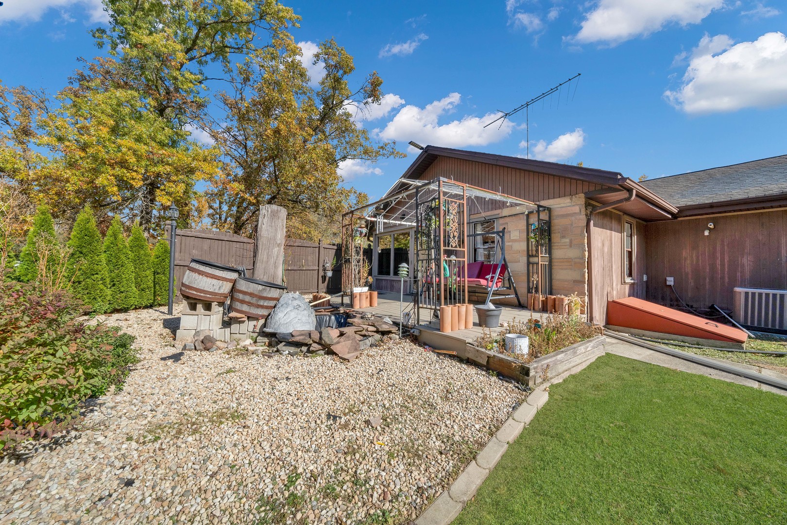 2135 West Richton Road Steger, IL 60475 - Photo 33 of 35 a view of a backyard with a patio and outdoor seating