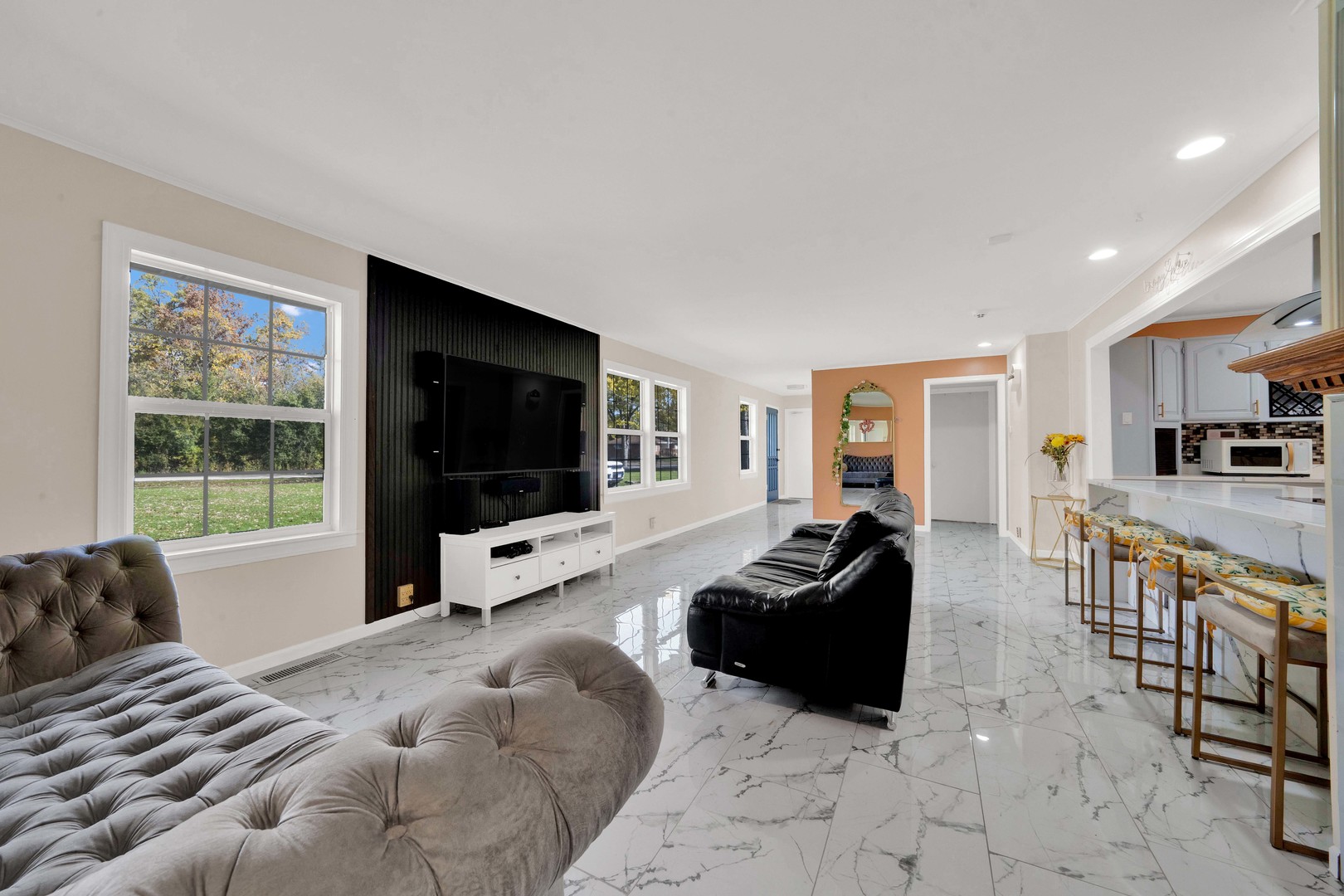 2135 West Richton Road Steger, IL 60475 - Photo 5 of 35 a living room with furniture and a flat screen tv