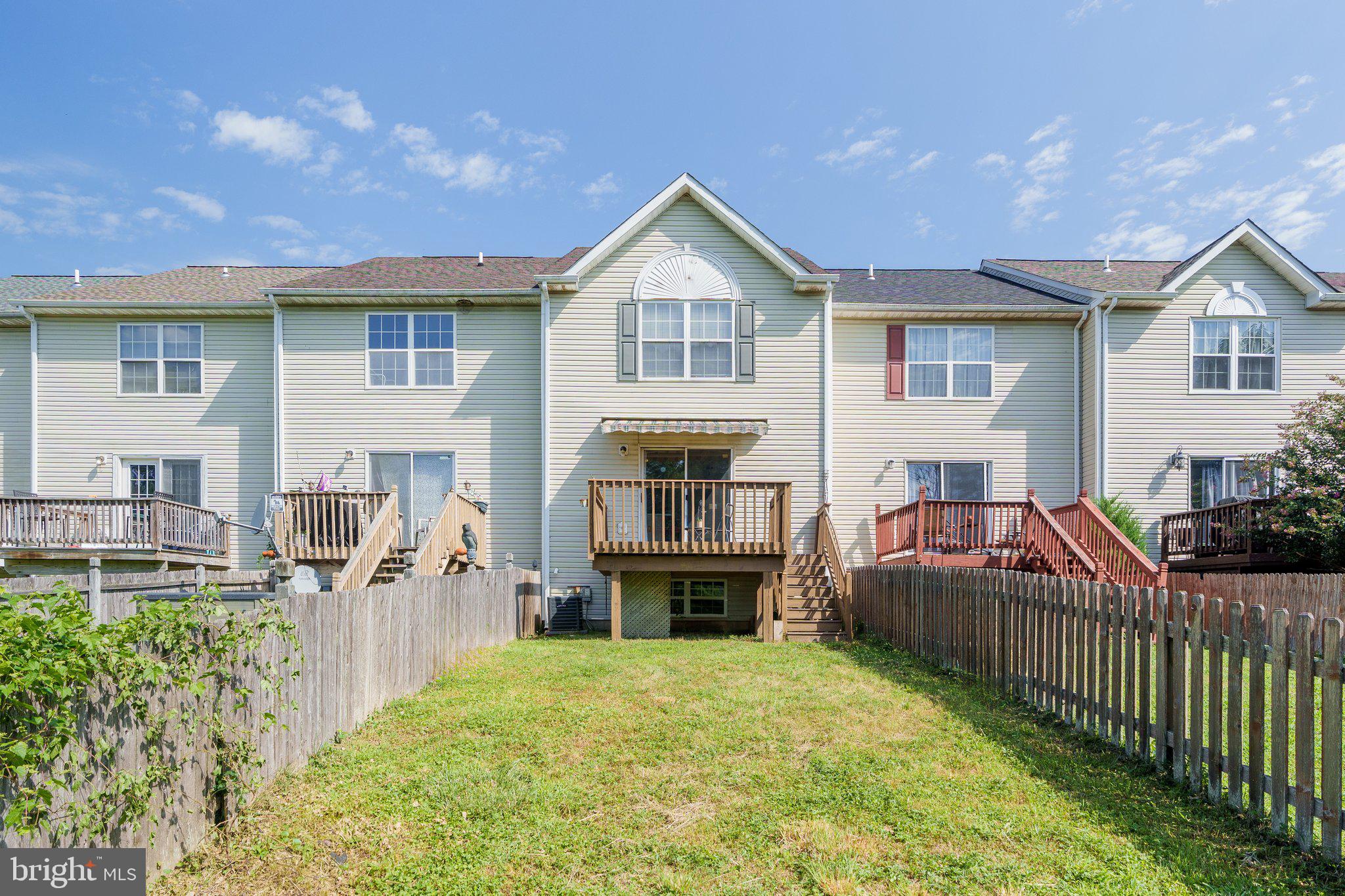 22 Buttonbush Court Elkton, MD 21921 - Photo 13 of 13 a front view of house with yard outdoor seating and barbeque oven