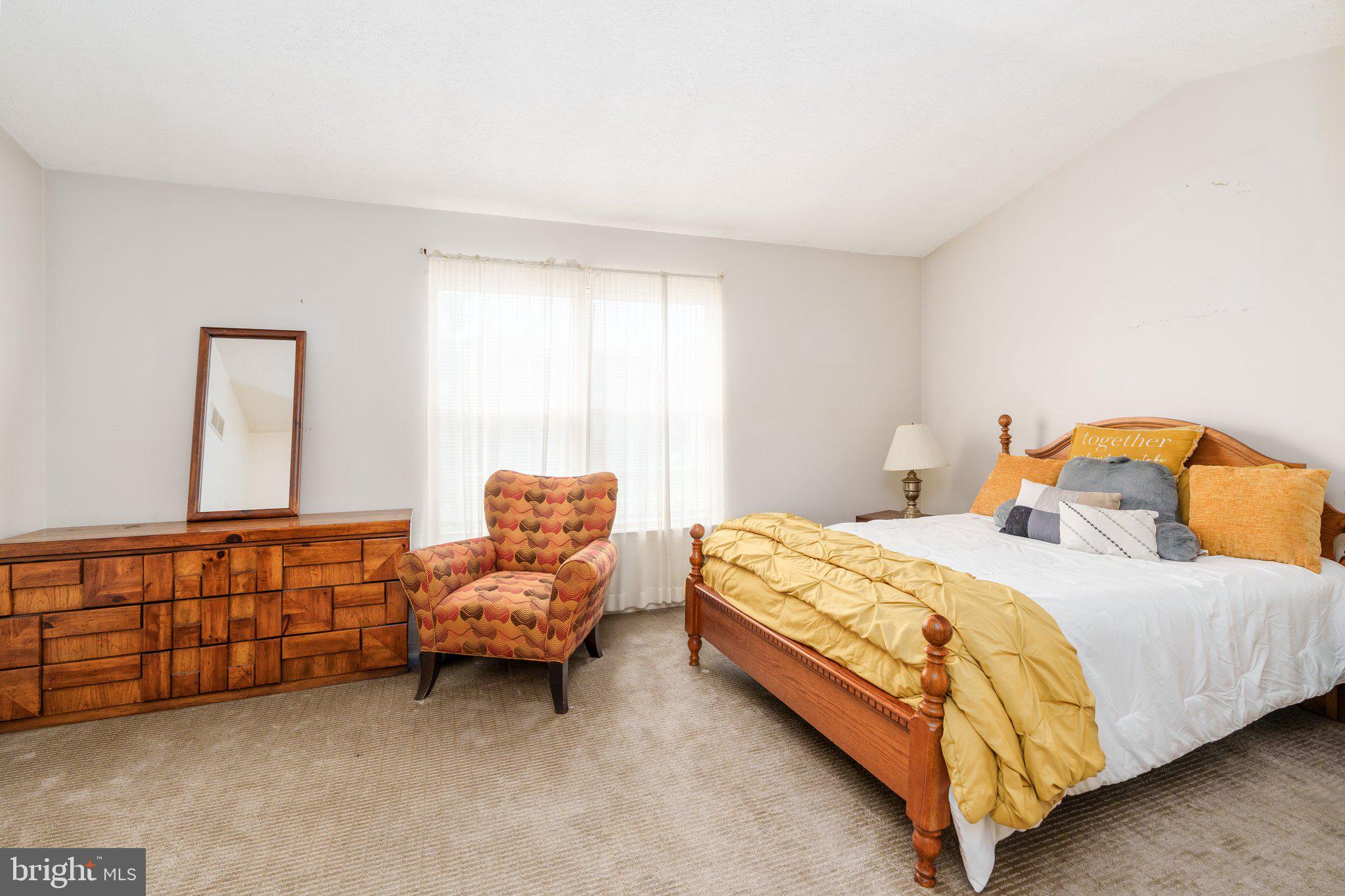 22 Buttonbush Court Elkton, MD 21921 - Photo 6 of 13 a bedroom with two beds and a couch