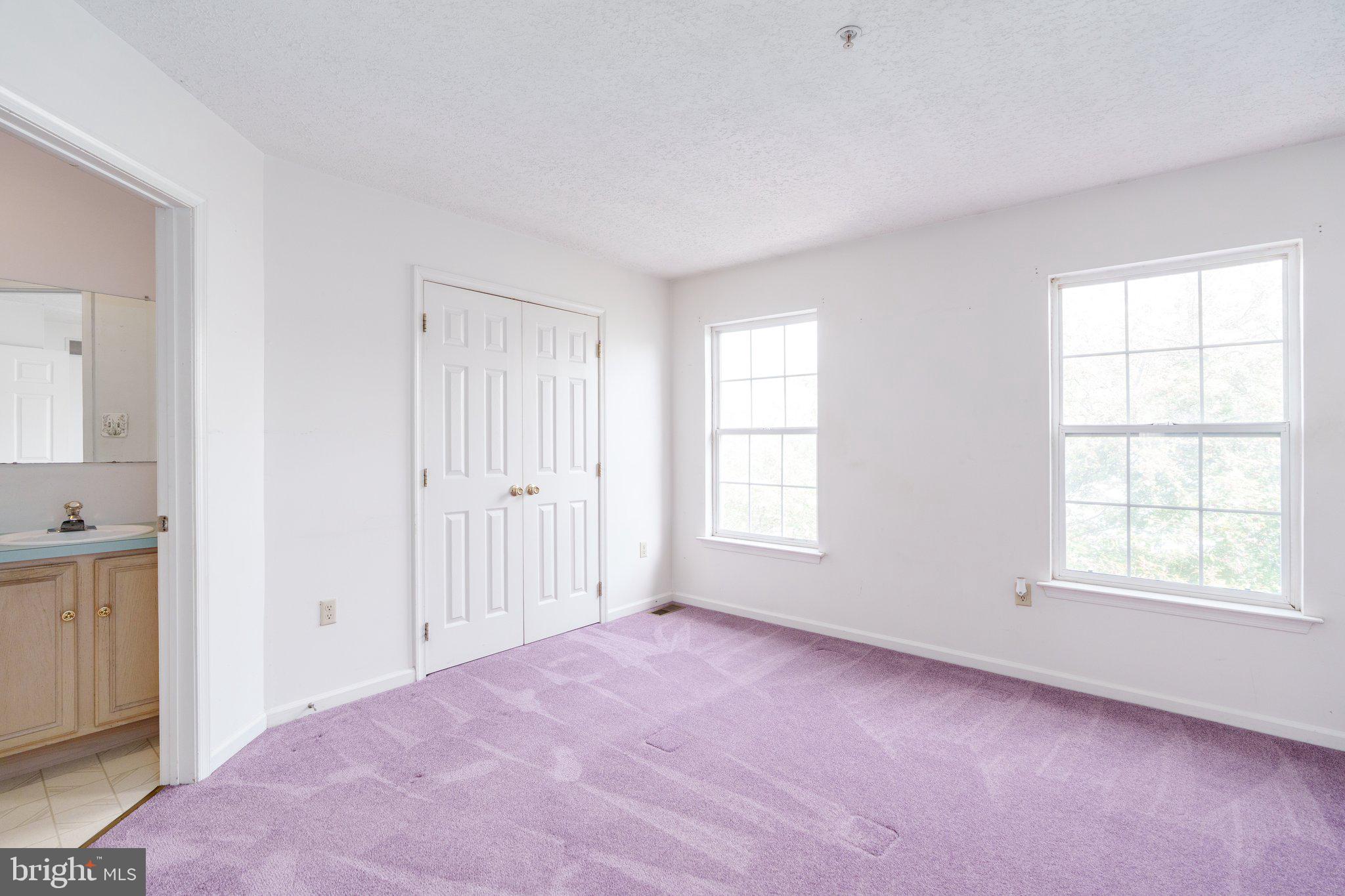 22 Buttonbush Court Elkton, MD 21921 - Photo 8 of 13 an empty room with windows