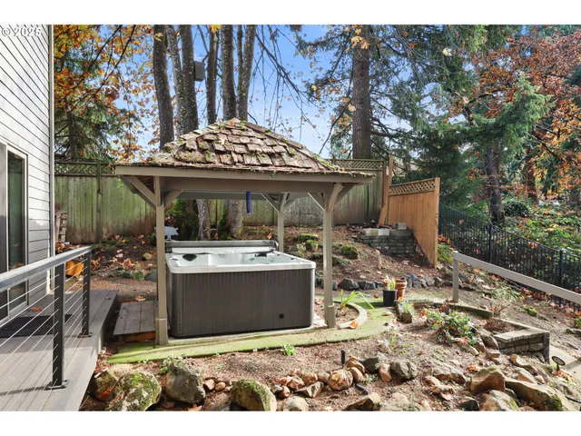 a view of a yard with a tree