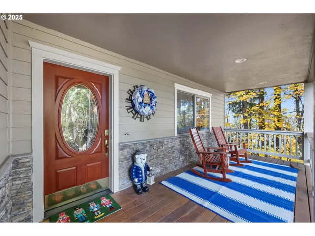 a view of a entryway with wooden floor