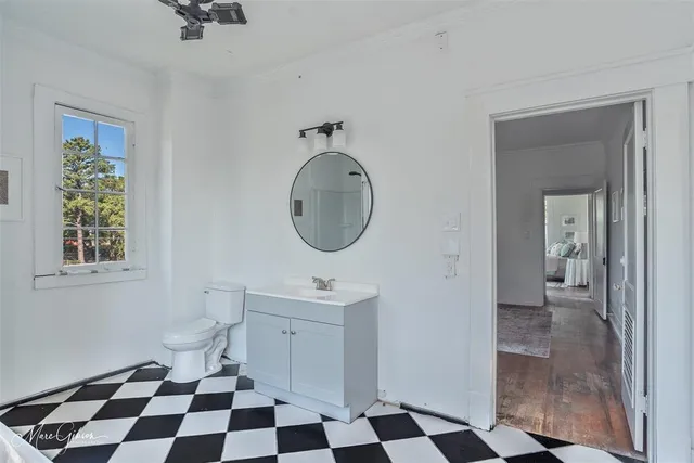 a black and white checkered floor with a black white checkered floor