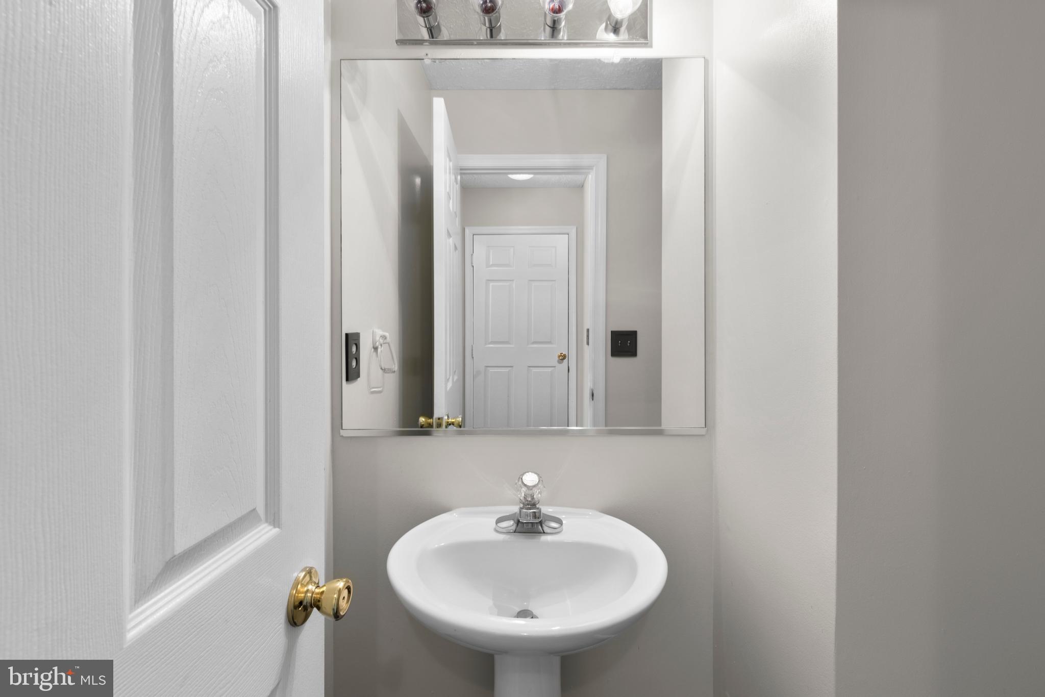 107 Bragg Boulevard Odenton, MD 21113 - Photo 14 of 39 Main level half bath