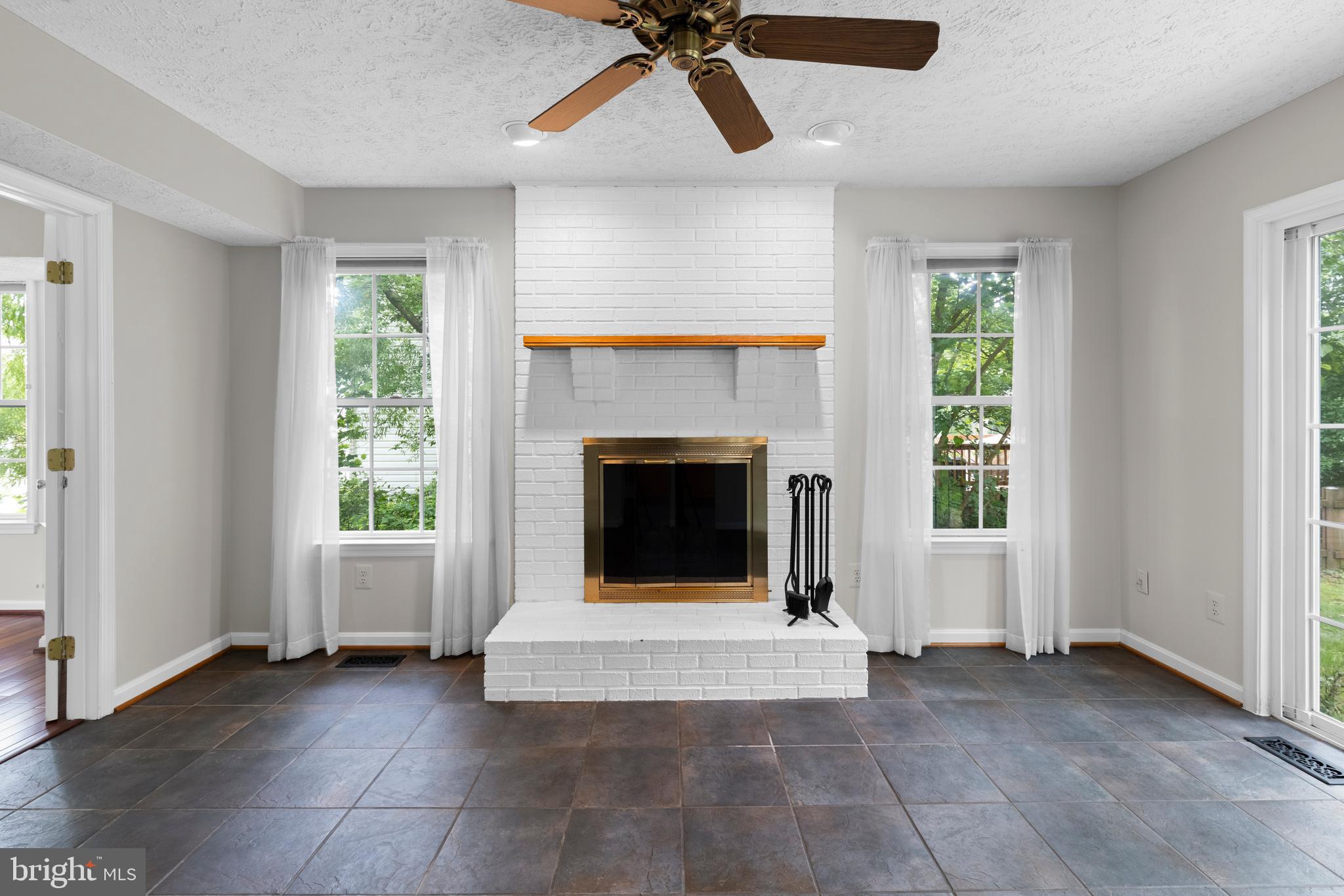 107 Bragg Boulevard Odenton, MD 21113 - Photo 8 of 39 Family room with fireplace