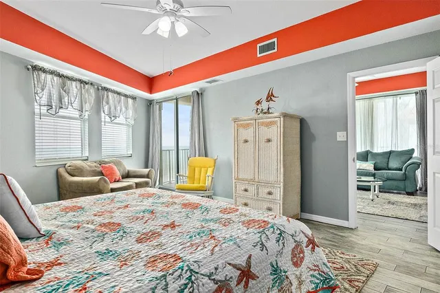 a bedroom with bed and window