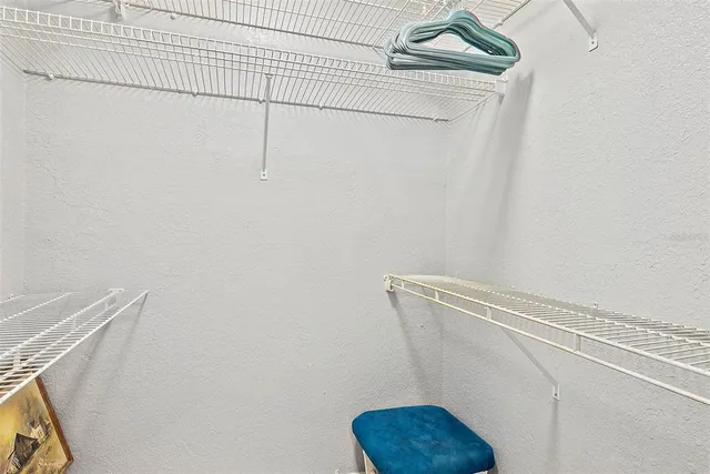 a view of small space with racks on the wall