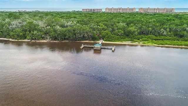 a room with gym equipment and a large window