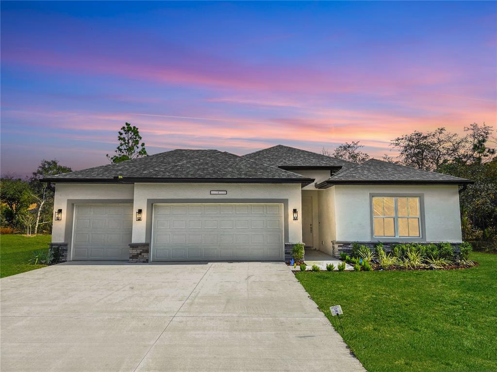 6 Calendula Court Homosassa, FL 34446 - Photo 1 of 67 front view of a house with a yard