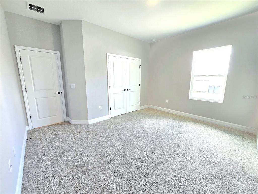 6 Calendula Court Homosassa, FL 34446 - Photo 48 of 67 an empty room with windows and closet