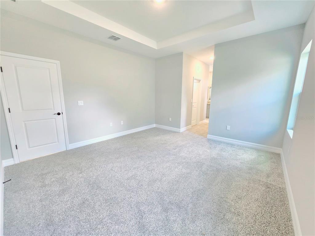 6 Calendula Court Homosassa, FL 34446 - Photo 54 of 67 a view of an empty room and a window