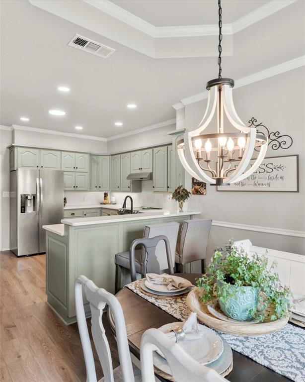 3006 Master Dr Mount Mount Pleasant, TX 75455 - Photo 12 of 34 a kitchen with a table and chairs in it