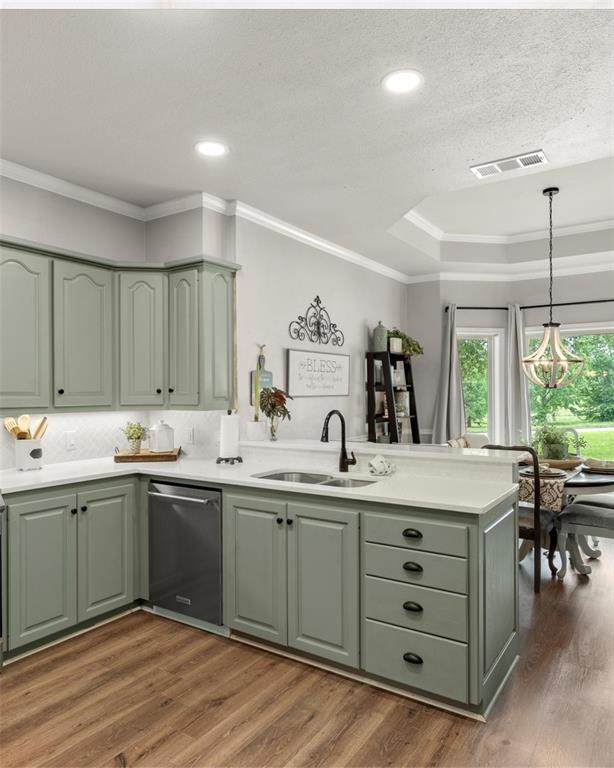 3006 Master Dr Mount Mount Pleasant, TX 75455 - Photo 13 of 34 a kitchen with a sink cabinets and wooden floor