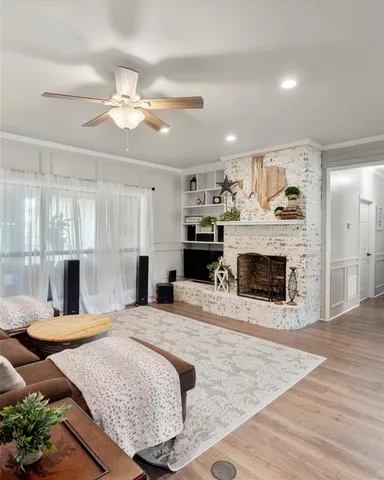 a large bedroom with a bed and a fireplace