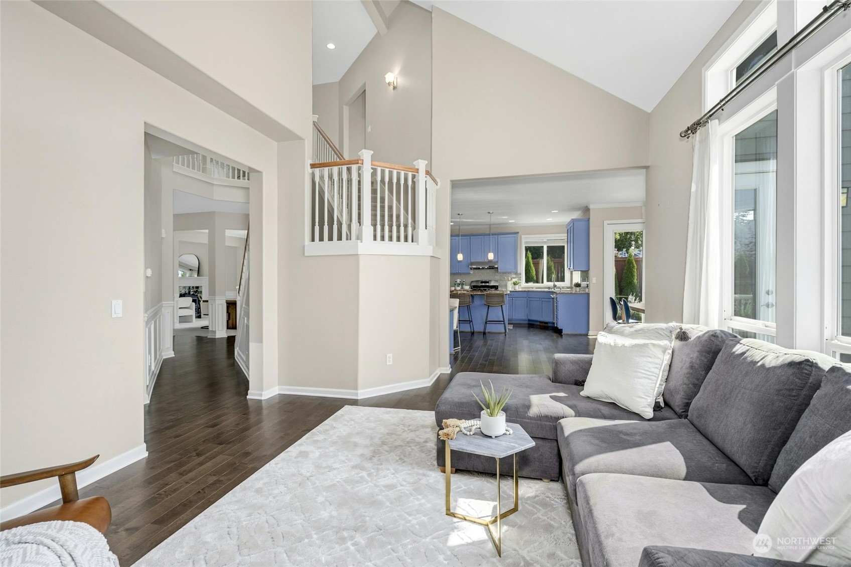 2425 Northeast 20th Street Renton, WA 98056 - Photo 21 of 39 a living room with furniture and a wooden floor
