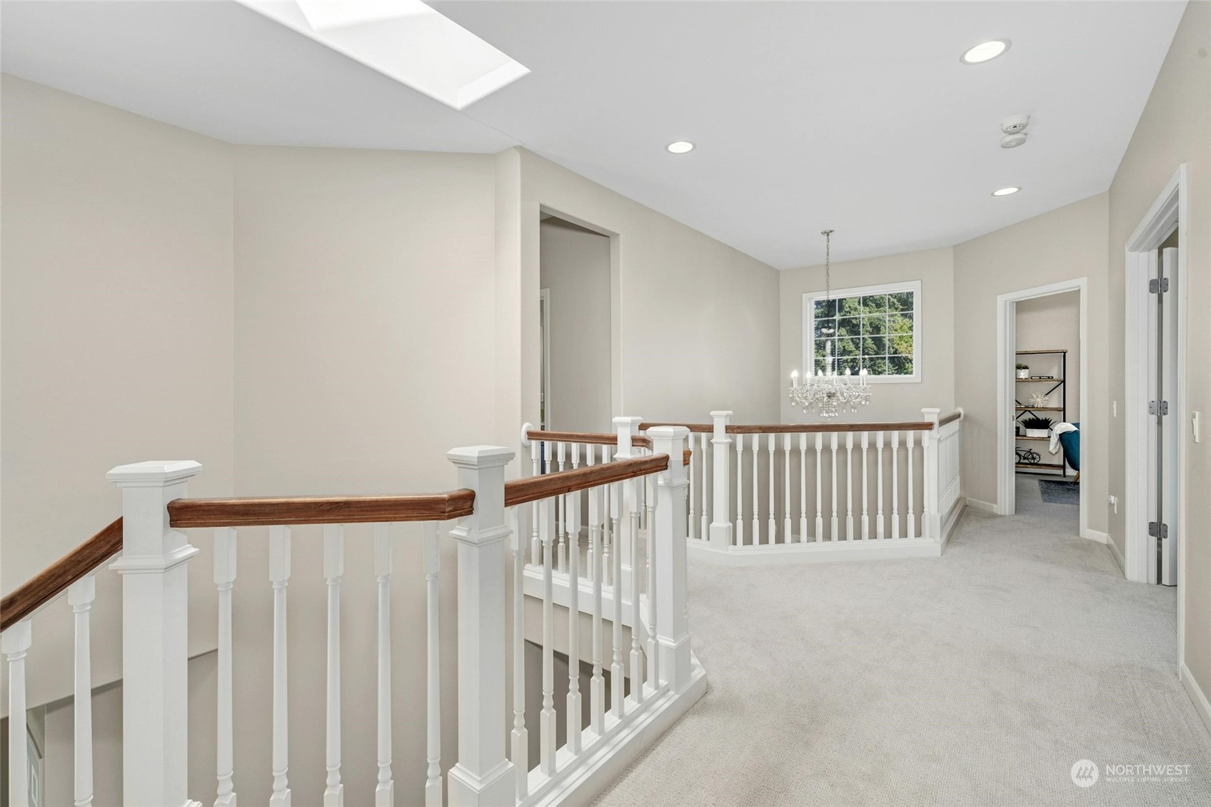 2425 Northeast 20th Street Renton, WA 98056 - Photo 23 of 39 a view of a hallway with a bedroom and windows
