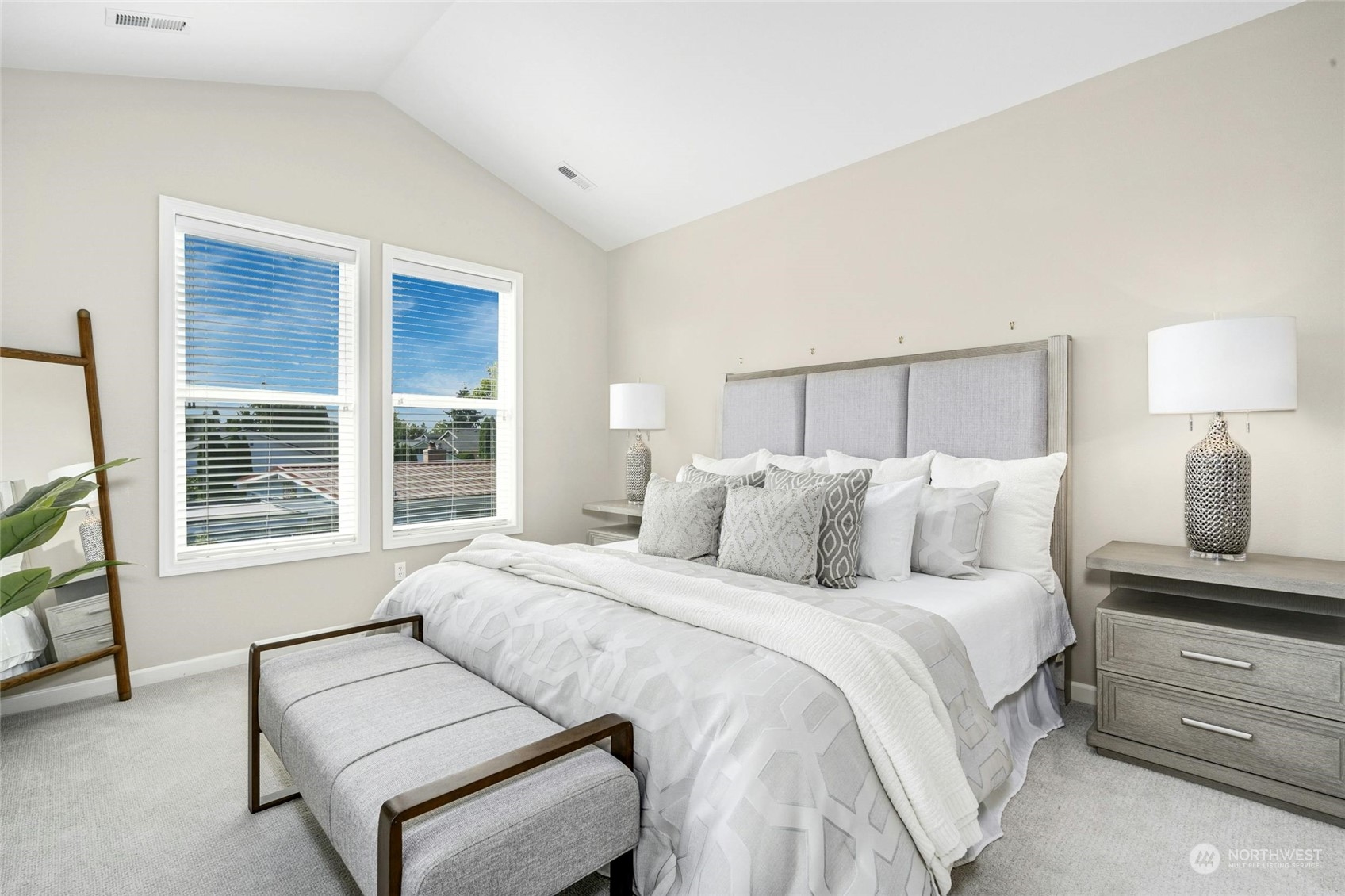 2425 Northeast 20th Street Renton, WA 98056 - Photo 24 of 39 a bedroom with a bed and a chair