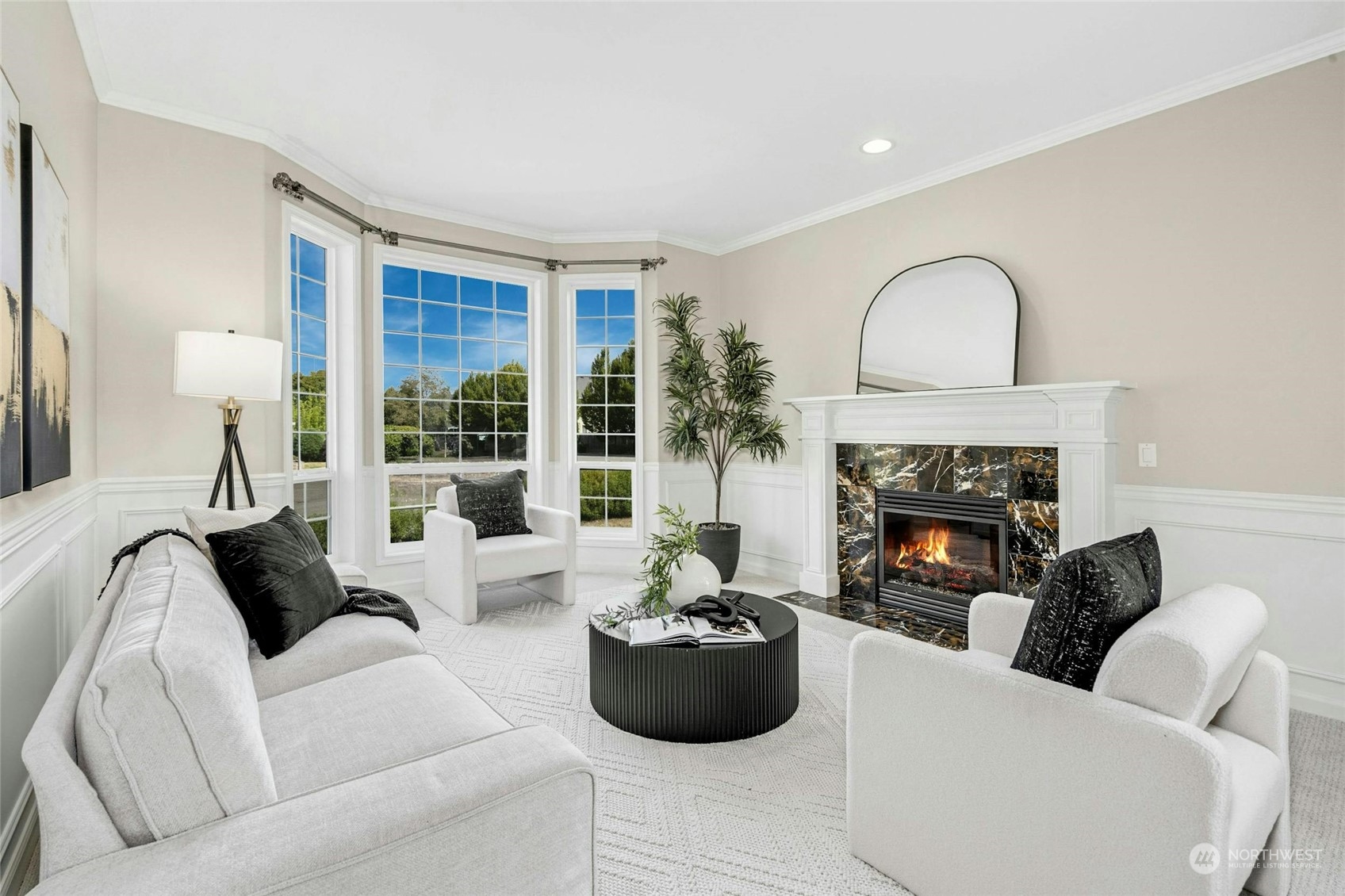 2425 Northeast 20th Street Renton, WA 98056 - Photo 6 of 39 a living room with furniture and a fireplace