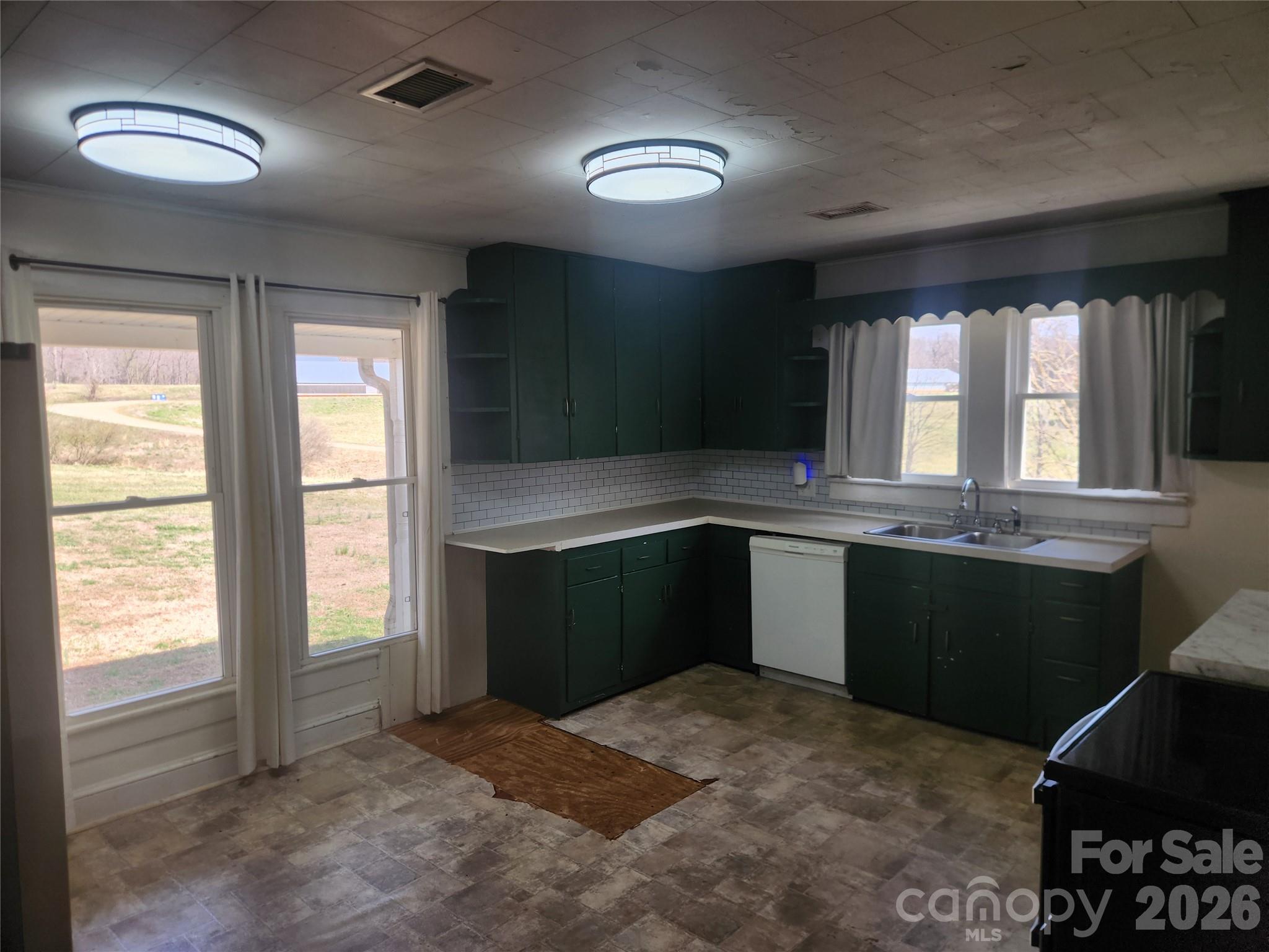 363 Center Church Road Hiddenite, NC 28636 - Photo 19 of 48 a kitchen with a sink and large window