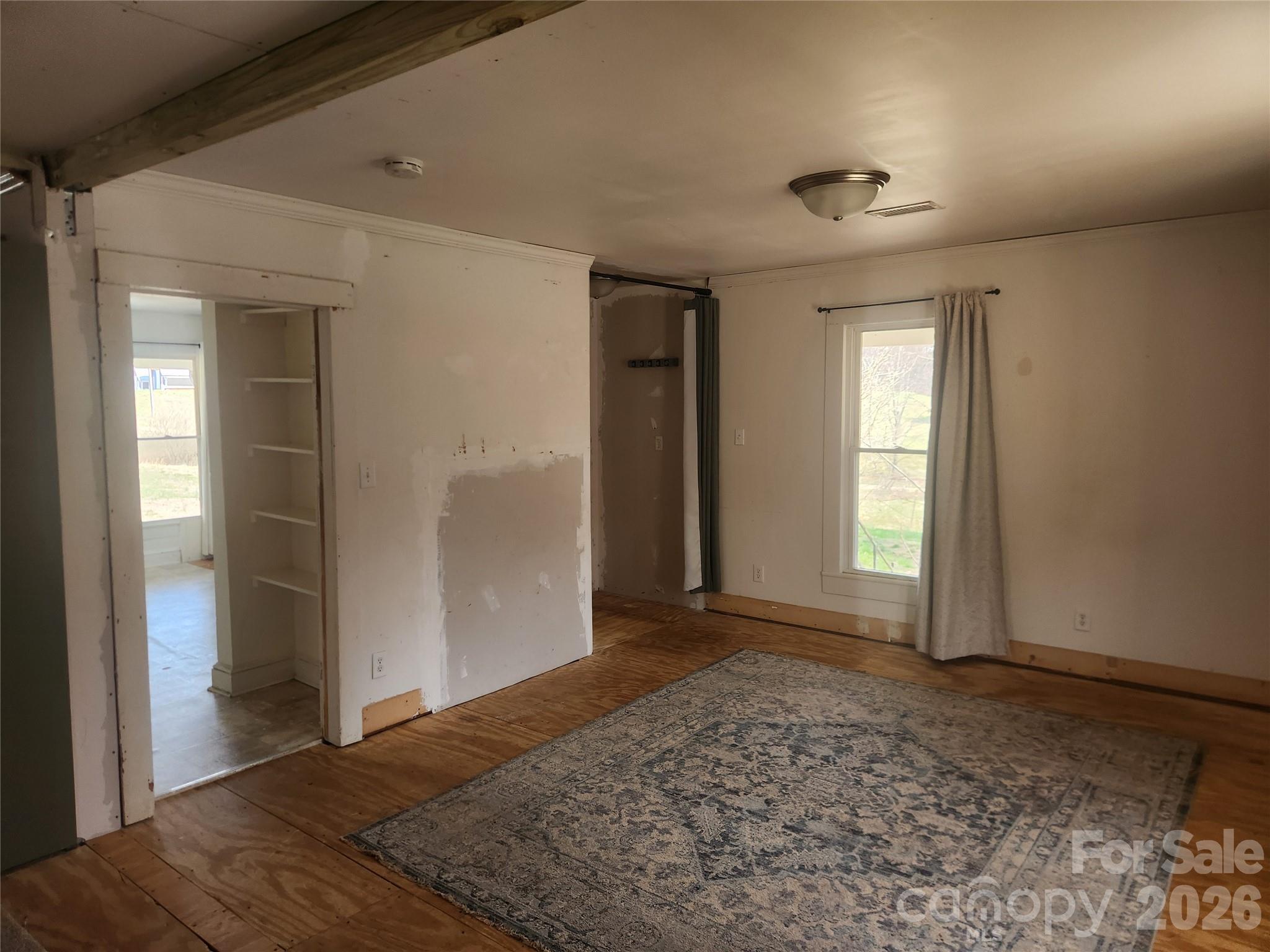 363 Center Church Road Hiddenite, NC 28636 - Photo 23 of 48 an empty room with windows and closet