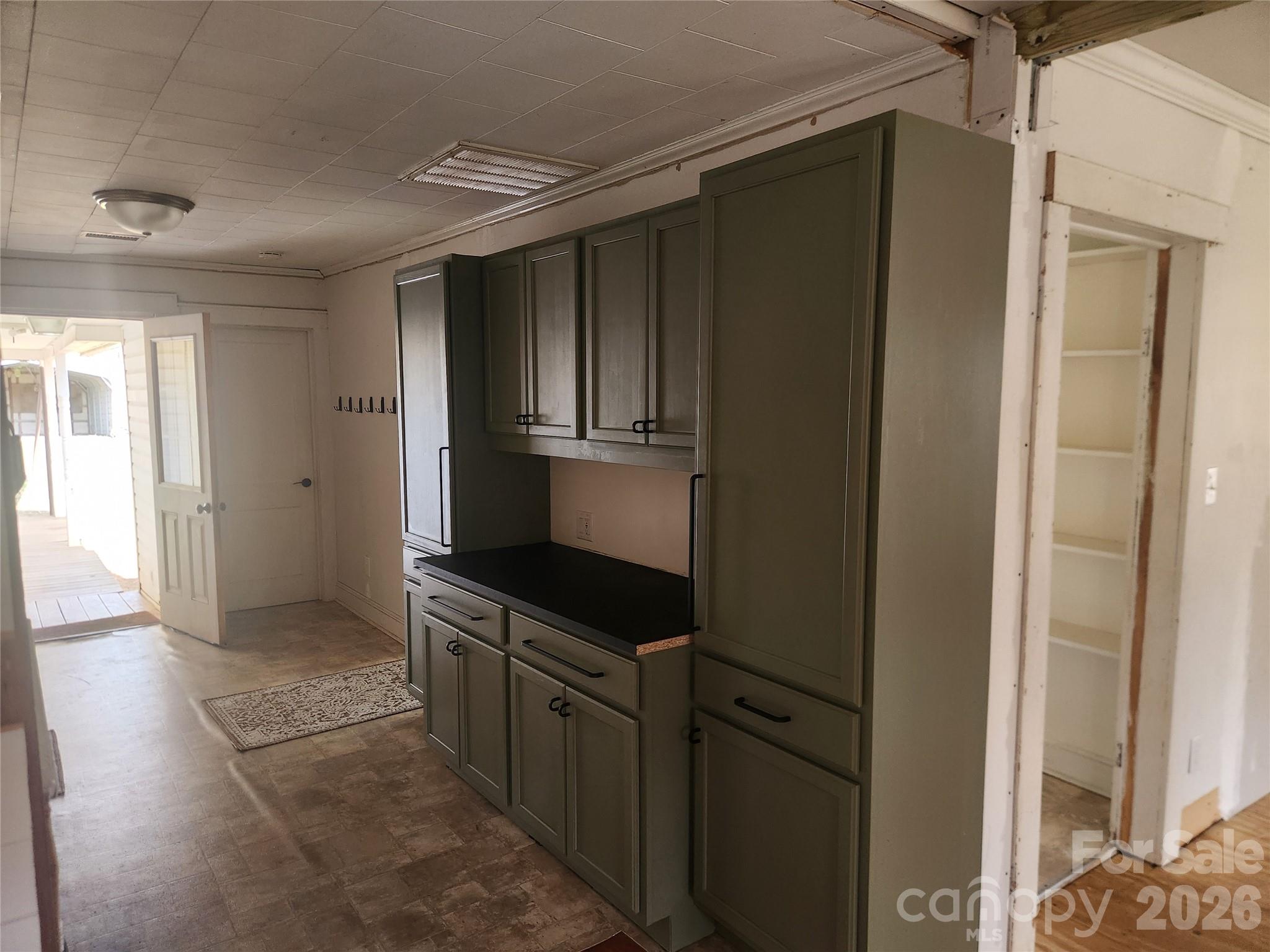 363 Center Church Road Hiddenite, NC 28636 - Photo 25 of 48 a kitchen with stainless steel appliances granite countertop a refrigerator and a sink