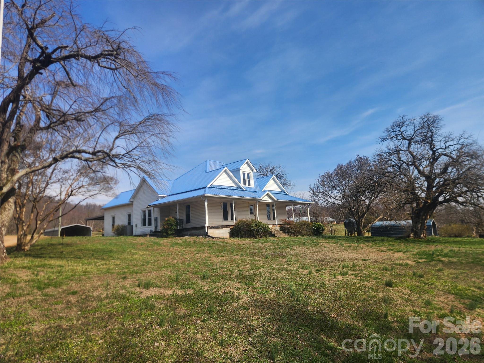 363 Center Church Road Hiddenite, NC 28636 - Photo 6 of 48 a view of a house with a yard