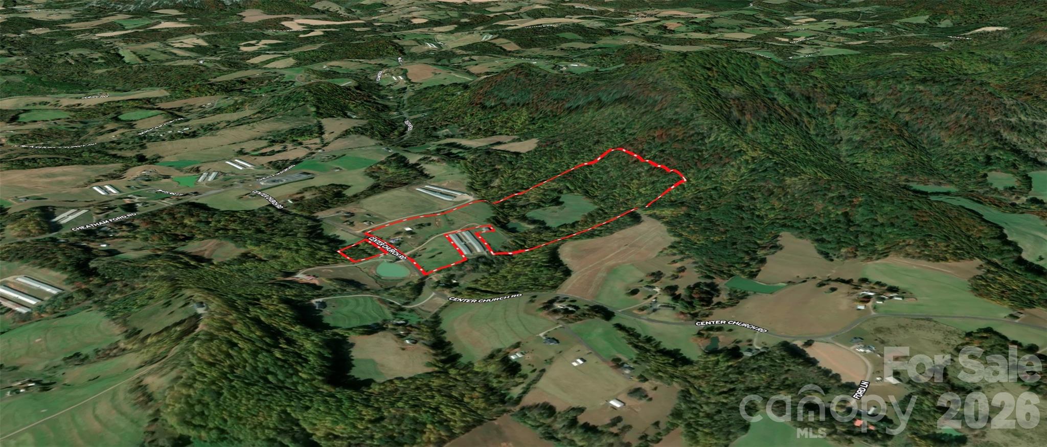 363 Center Church Road Hiddenite, NC 28636 - Photo 10 of 48 an aerial view of a house with yard
