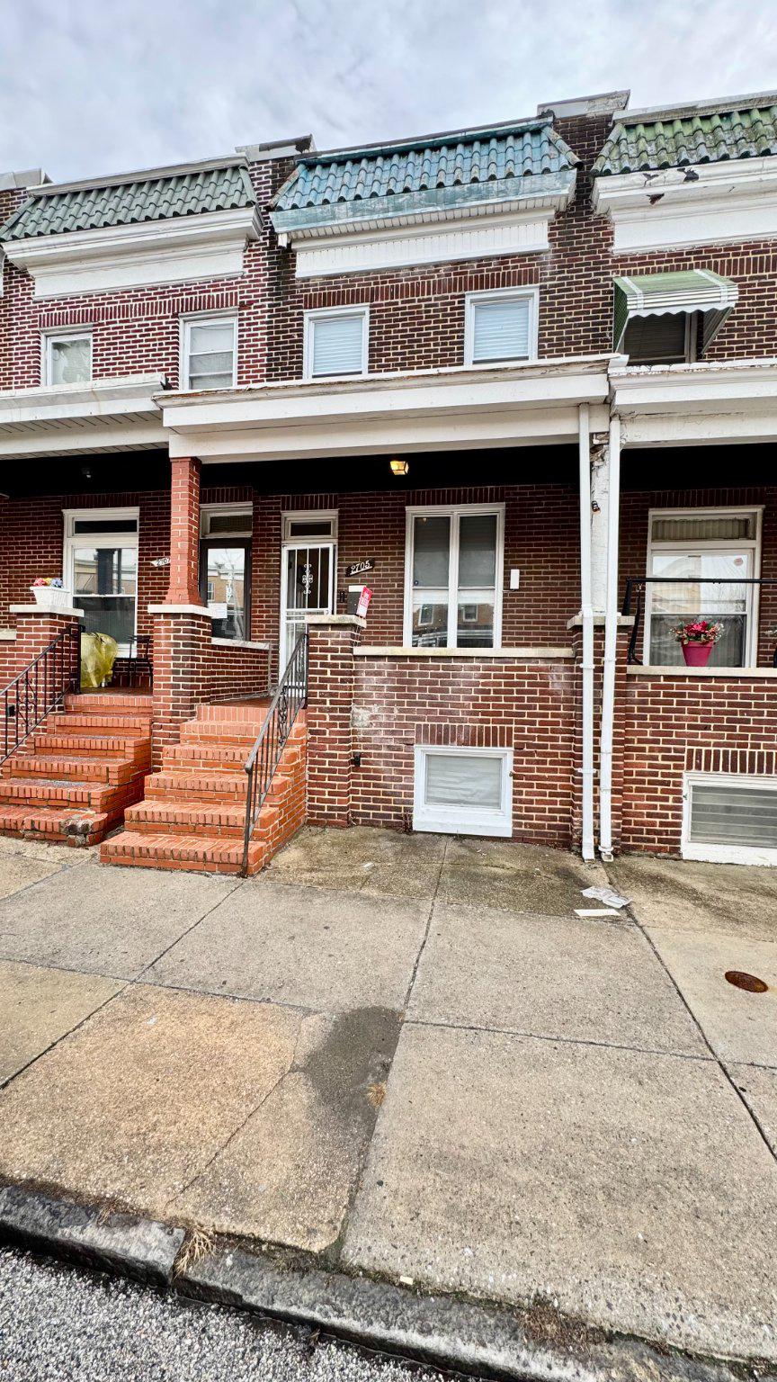 2705 East Biddle Street Baltimore, MD 21213 - Photo 1 of 12 a front view of a building