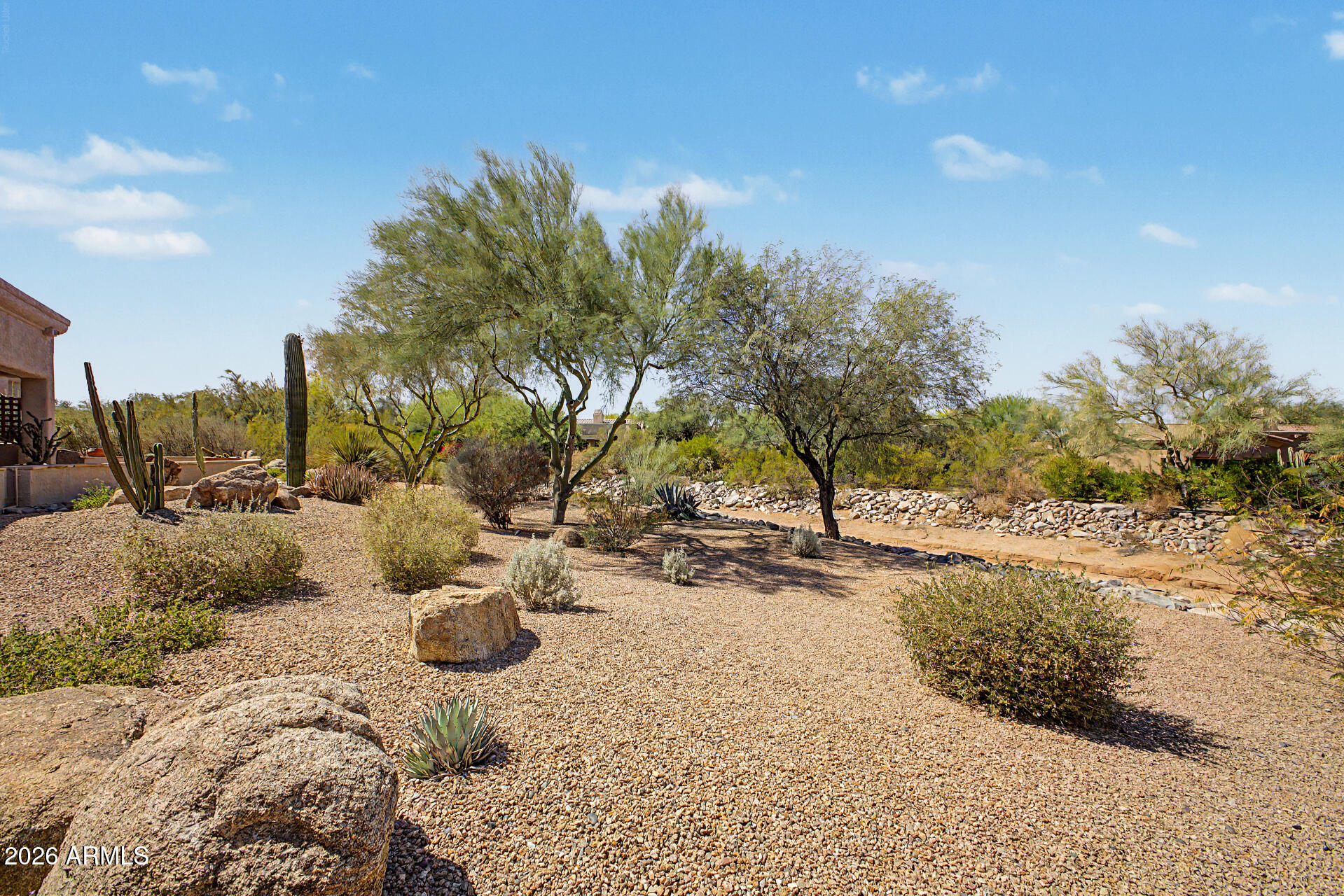 27909 North Quail Spring Road Rio Verde, AZ 85263 - Photo 35 of 52 a view of a backyard of the house