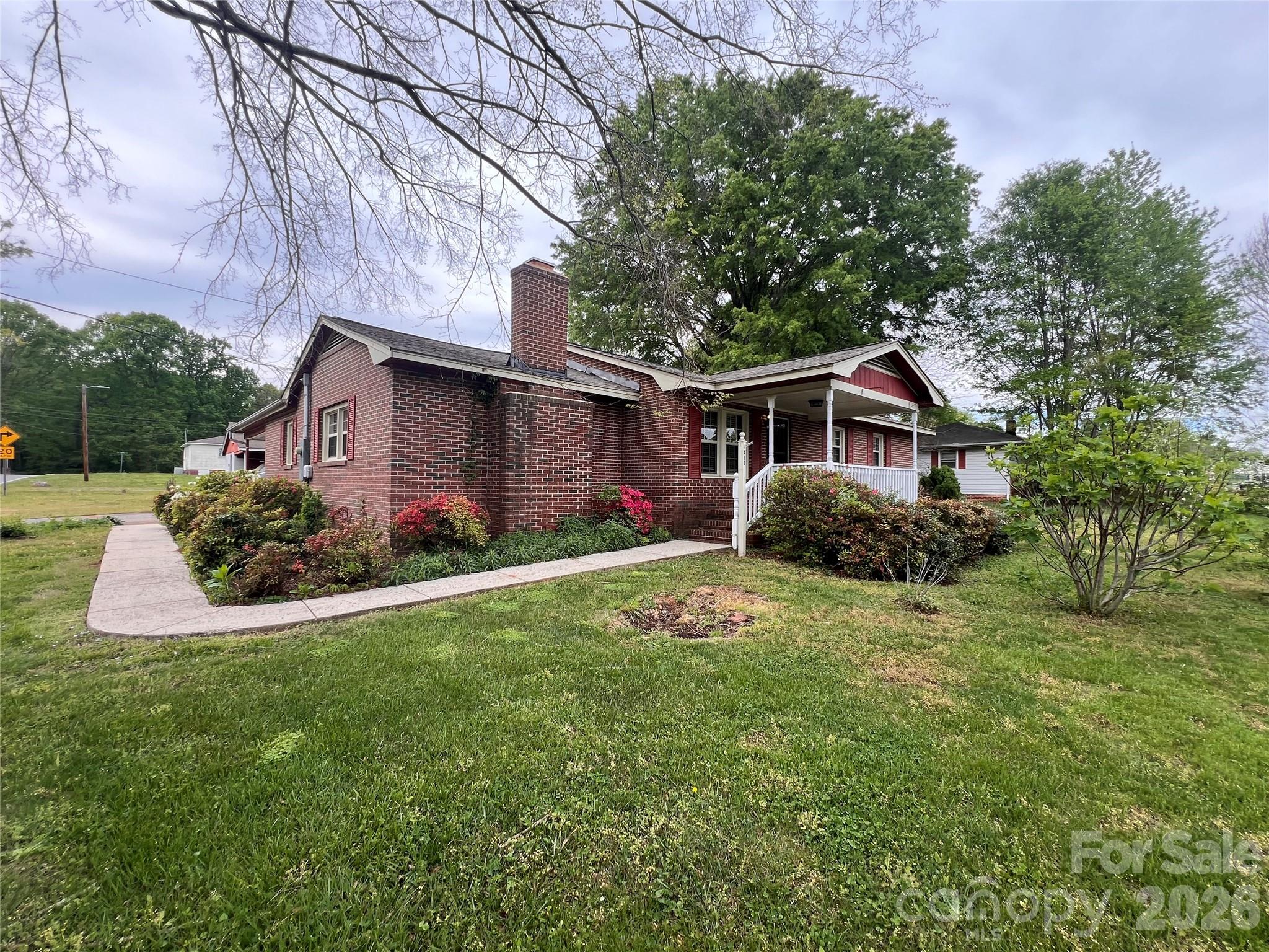 400 Stroupe Street Mount Holly, NC 28120 - Photo 1 of 26 a front view of house with yard and green space
