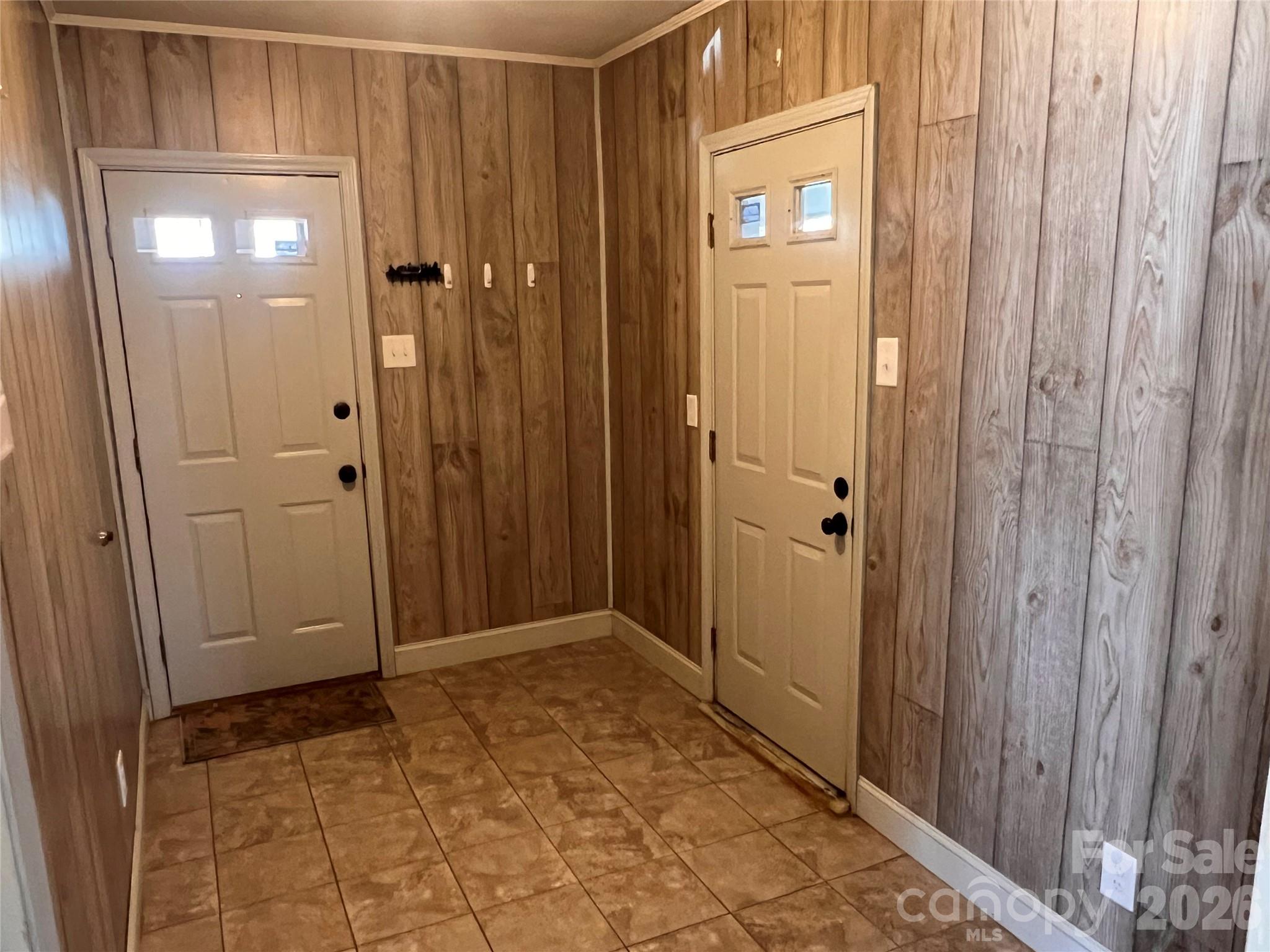 400 Stroupe Street Mount Holly, NC 28120 - Photo 16 of 26 a view of a hallway with wooden floor