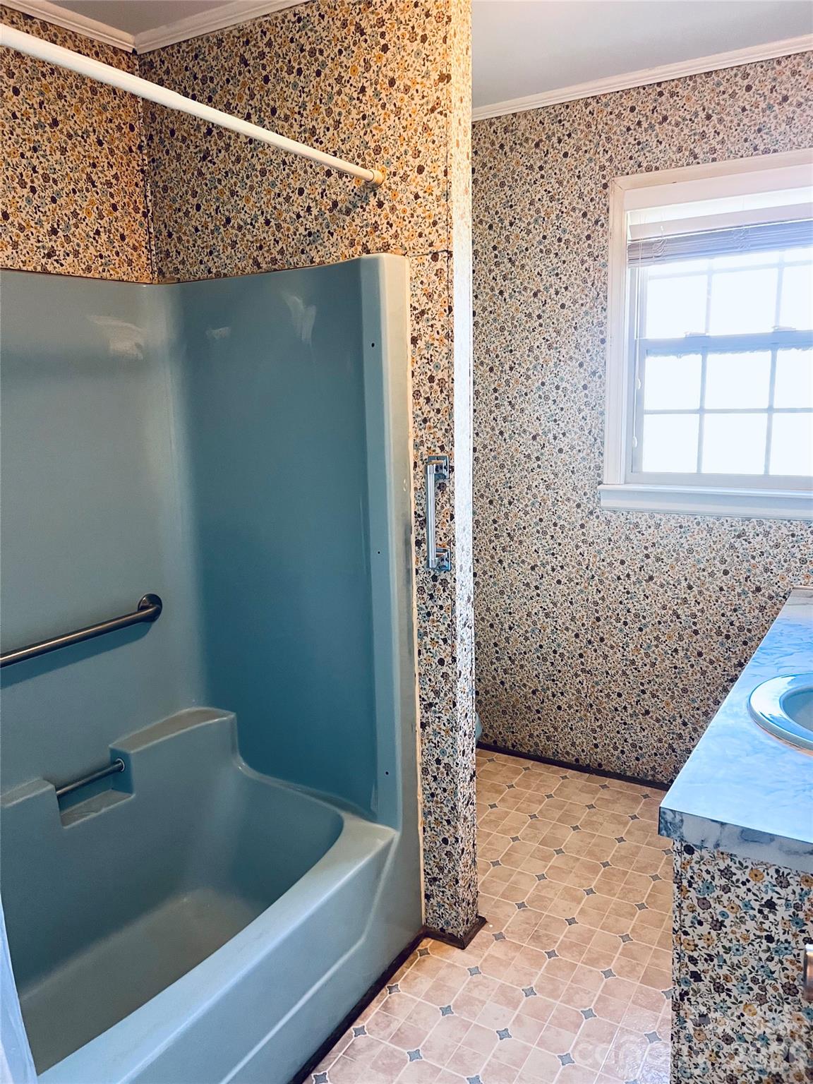 400 Stroupe Street Mount Holly, NC 28120 - Photo 16 of 26 a bathroom with a bathtub