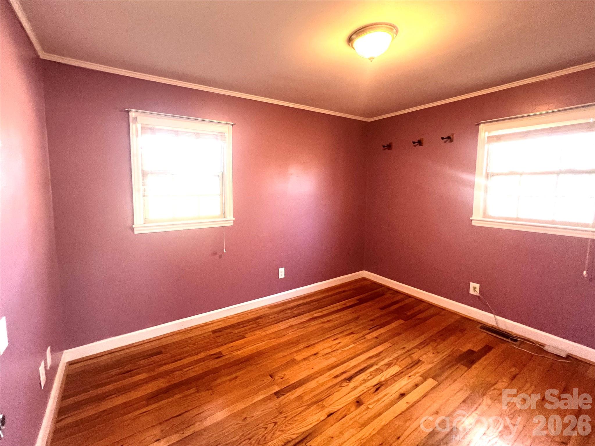 400 Stroupe Street Mount Holly, NC 28120 - Photo 22 of 26 a view of room with window and ceiling fan
