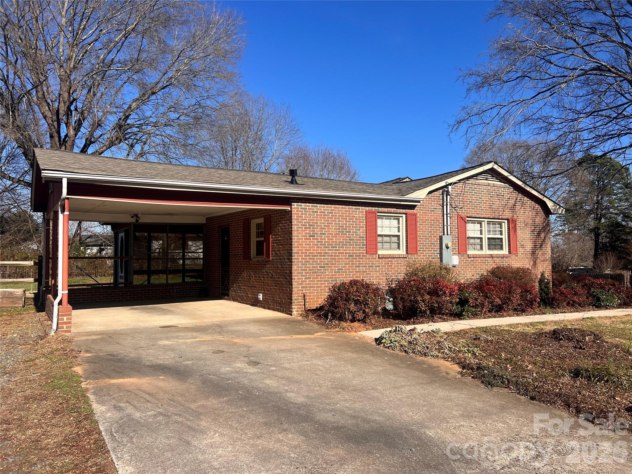 400 Stroupe Street Mount Holly, NC 28120 - Photo 24 of 26 a front view of a house with a yard