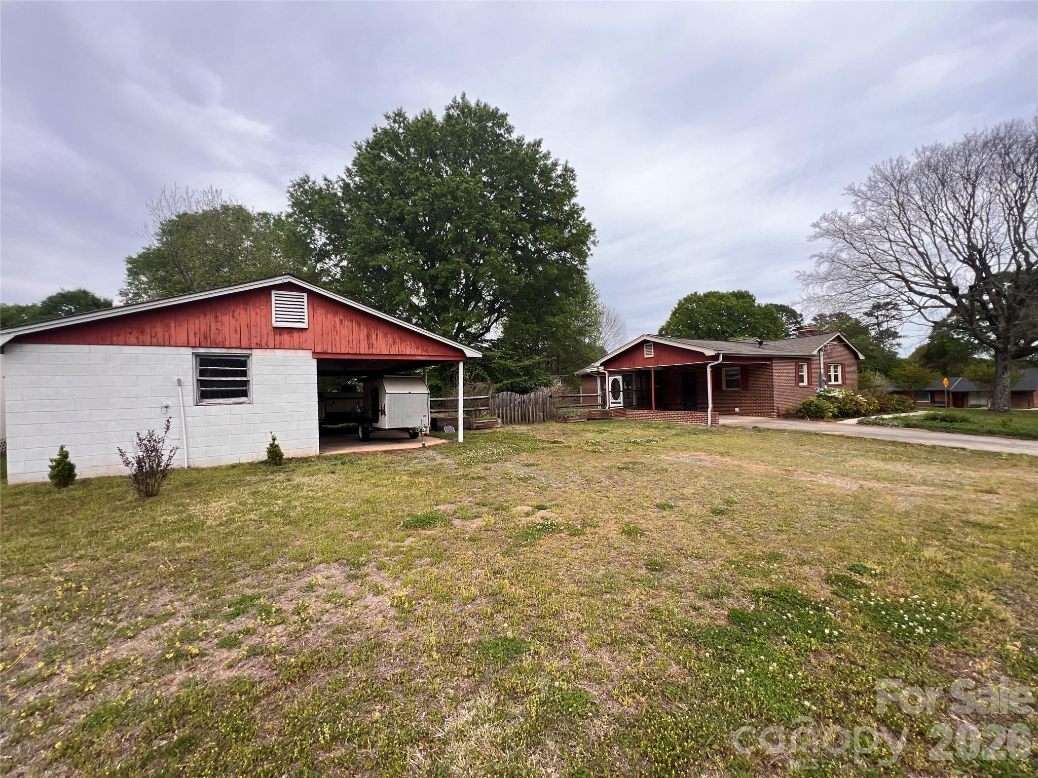 400 Stroupe Street Mount Holly, NC 28120 - Photo 26 of 26 a view of a house with a yard