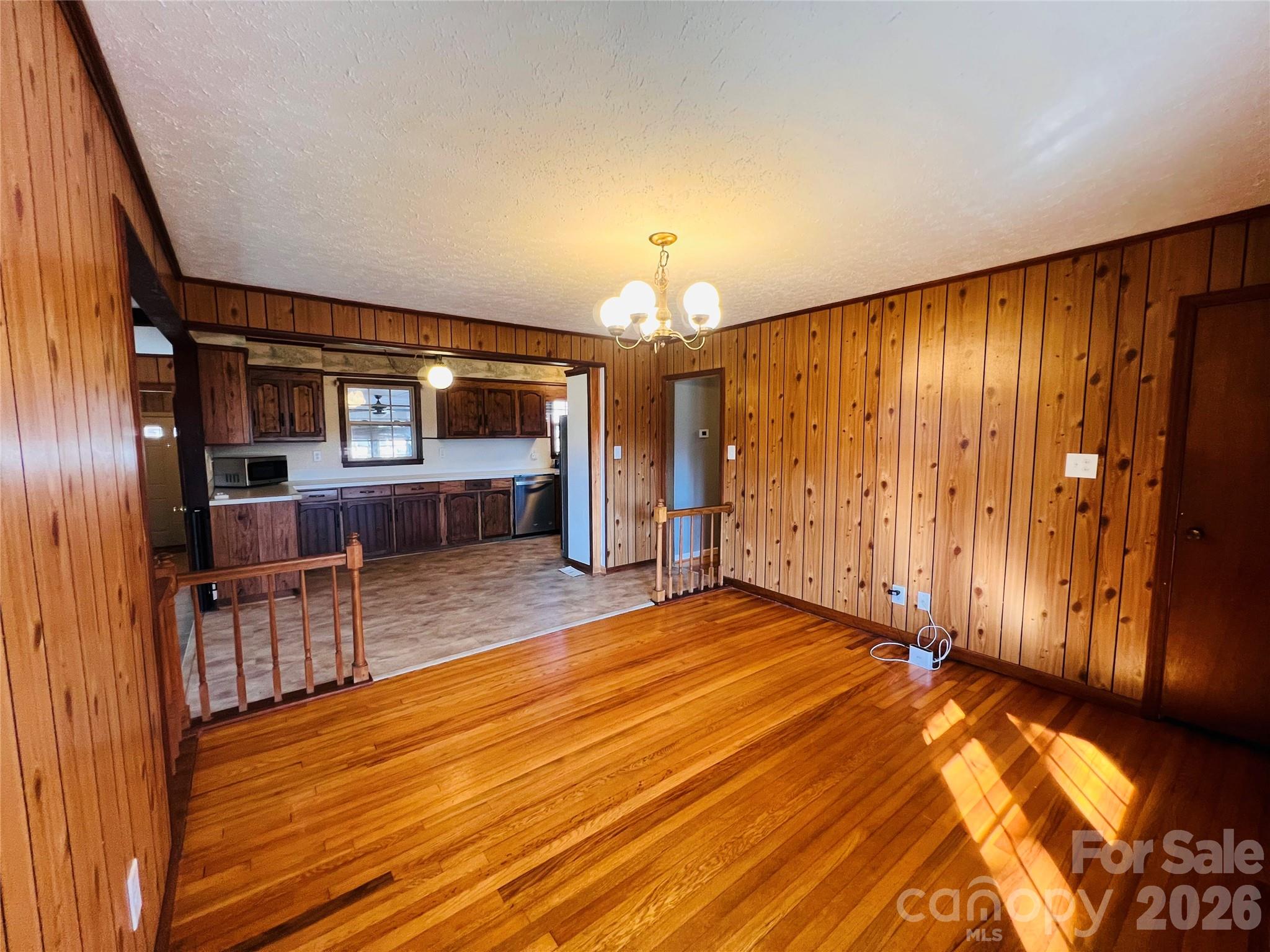 400 Stroupe Street Mount Holly, NC 28120 - Photo 3 of 26 a view of a livingroom with furniture wooden floor and window