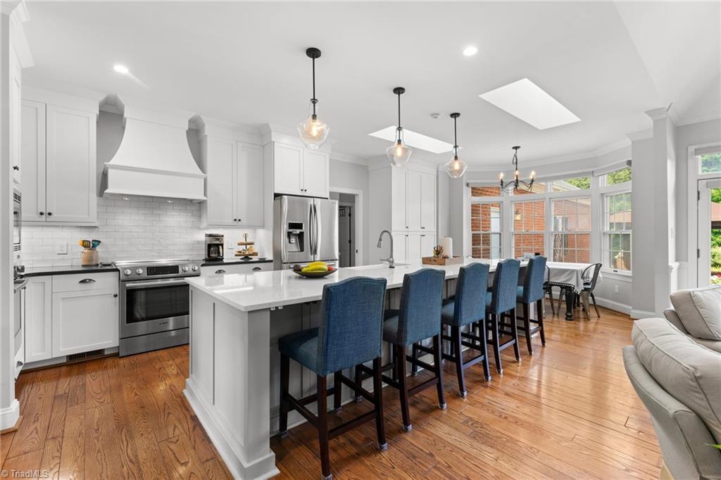 1044 Lasley Road Lewisville, NC 27023 - Photo 14 of 50 Stunning chef's kitchen with abundant prep space and custom finishes