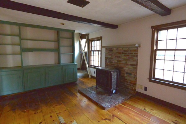 5 Spring Road Middleton, MA 01949 - Photo 6 of 16 a room with a fireplace and windows
