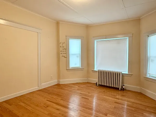 an empty room with windows