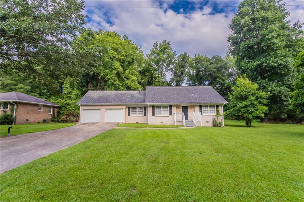 front view of a house with a yard