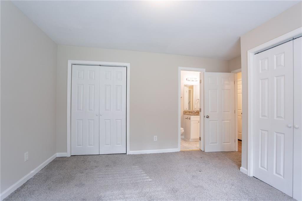 542 Hasty Drive Lithia Springs, GA 30122 - Photo 18 of 44 a view of an empty room and closet area