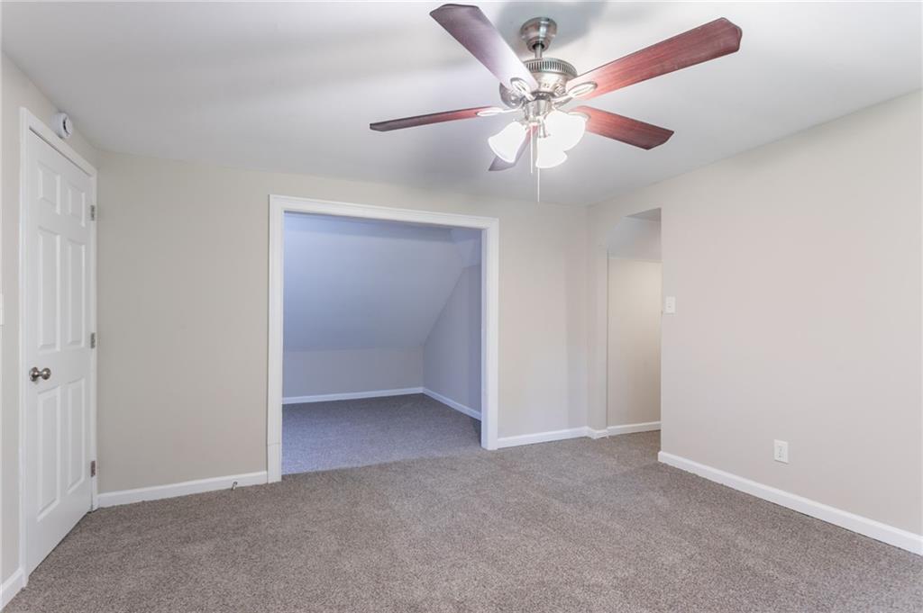 542 Hasty Drive Lithia Springs, GA 30122 - Photo 29 of 44 an empty room with closet and fan