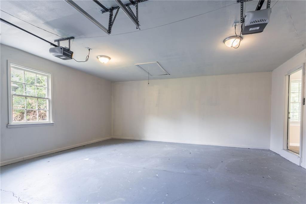 542 Hasty Drive Lithia Springs, GA 30122 - Photo 32 of 44 en empty room with windows and ceiling fan