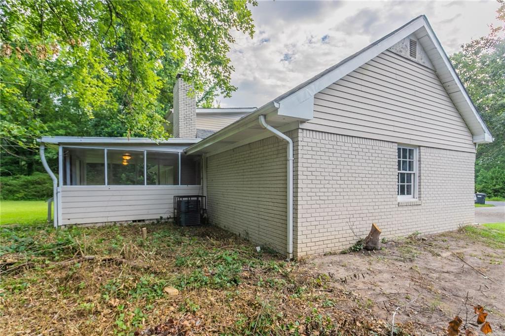 542 Hasty Drive Lithia Springs, GA 30122 - Photo 35 of 44 a house view with a backyard